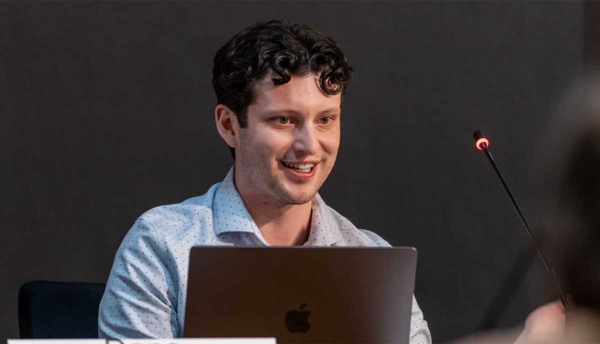 Dane Malenfant speaking at an event